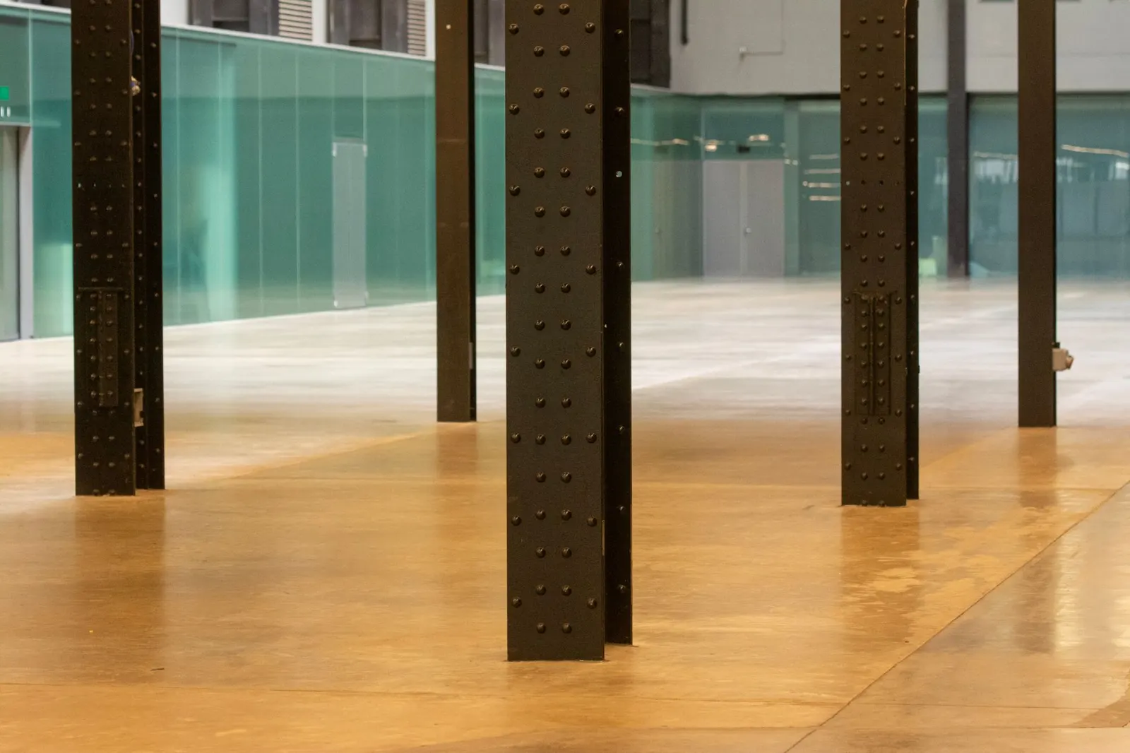 A polished commercial floor reflecting overhead lights
